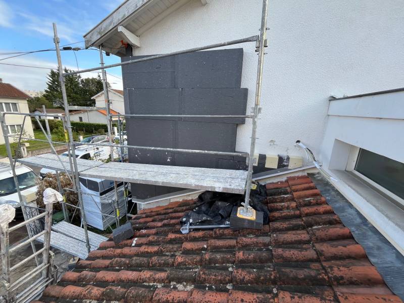 Mise en place d'isolant pignon sur toiture